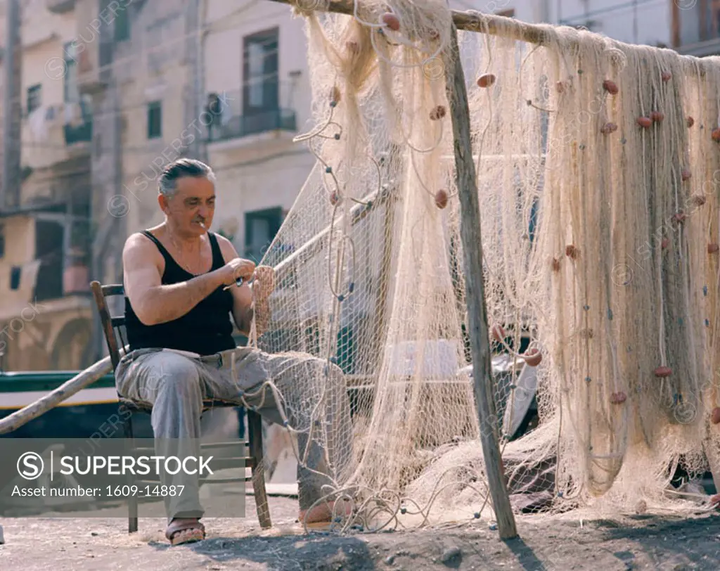 Fisherman Making Repairing Nets, Genoa (Genova), Liguria, Italy
