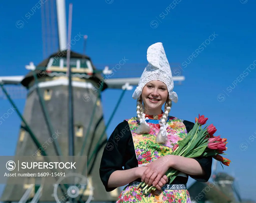 Girl Dressed in Dutch Costume in front of Windmill, Zaanse Schans, Scotland