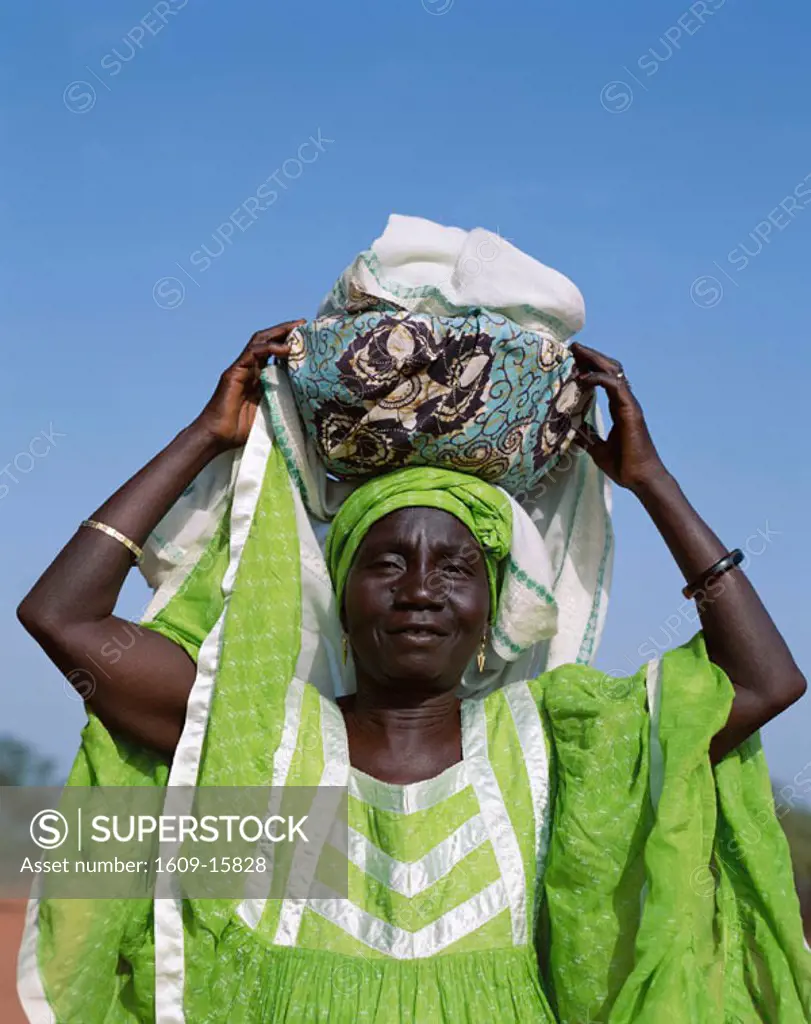 African Woman Carrying Bundle on Head, Banjul, Gambia