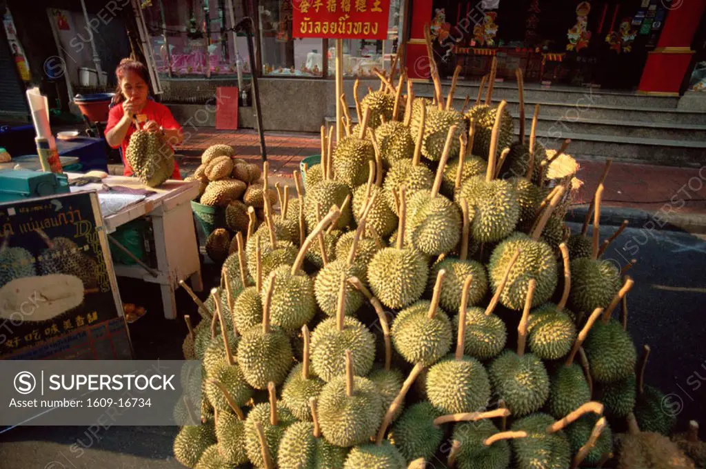 Thailand, Bangkok, Woman Street Vendor Selling Durians