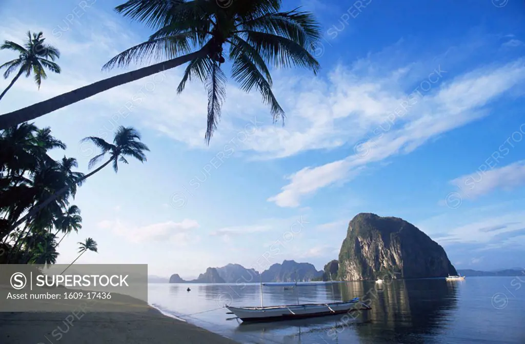 Philippines, Palawan, Bascuit Bay, El Nido, Outriggers on Tropical Beach