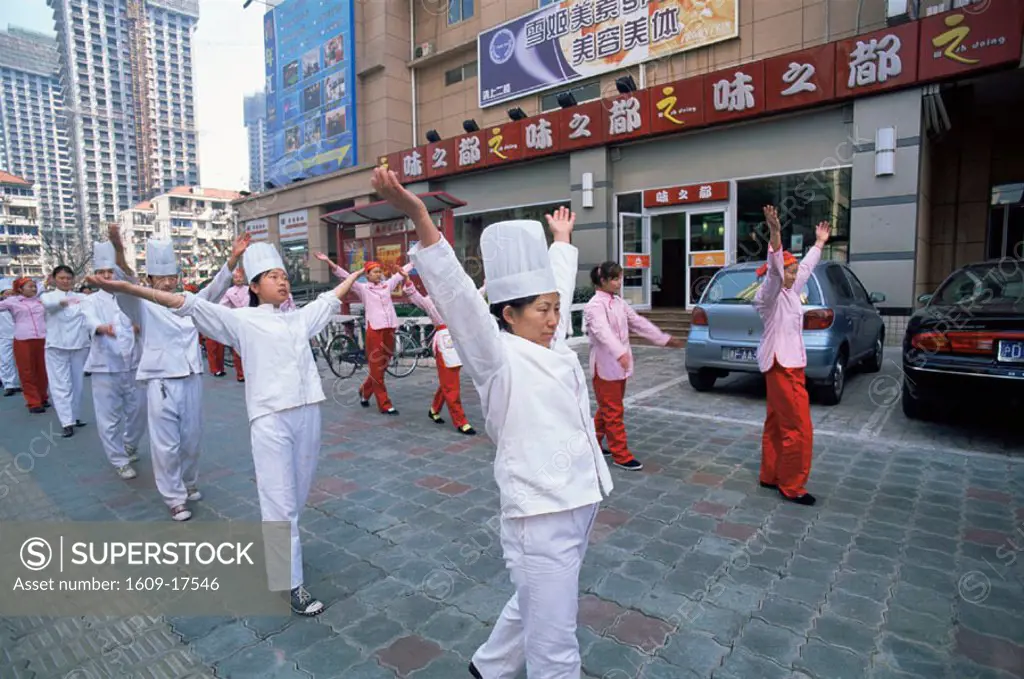 China, Shanghai, Restaurant Staff Performing Morning Exercises
