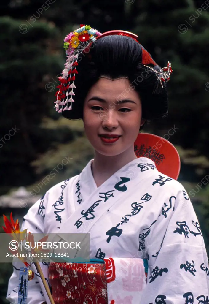 Geisha Girl  wearing a Kimono at festival, Japan