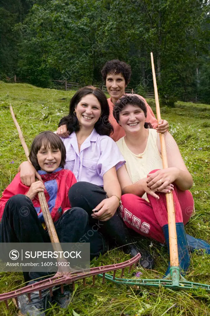 Women with rakes, Bucovina, Romania