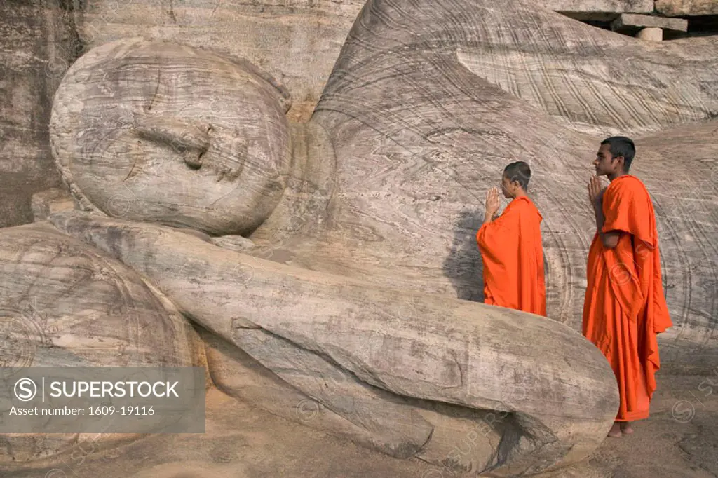 Monks praying to the Buddha, Gal Vihara, Polonnaruwa, Sri Lanka