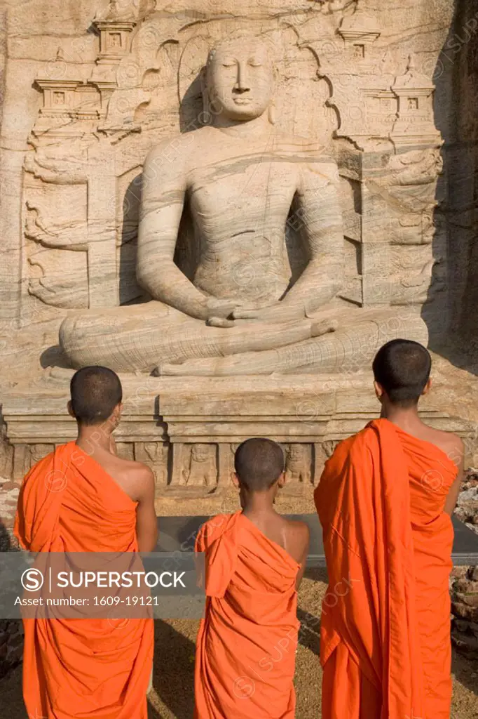 Monks praying to the Buddha, Gal Vihara, Polonnaruwa, Sri Lanka