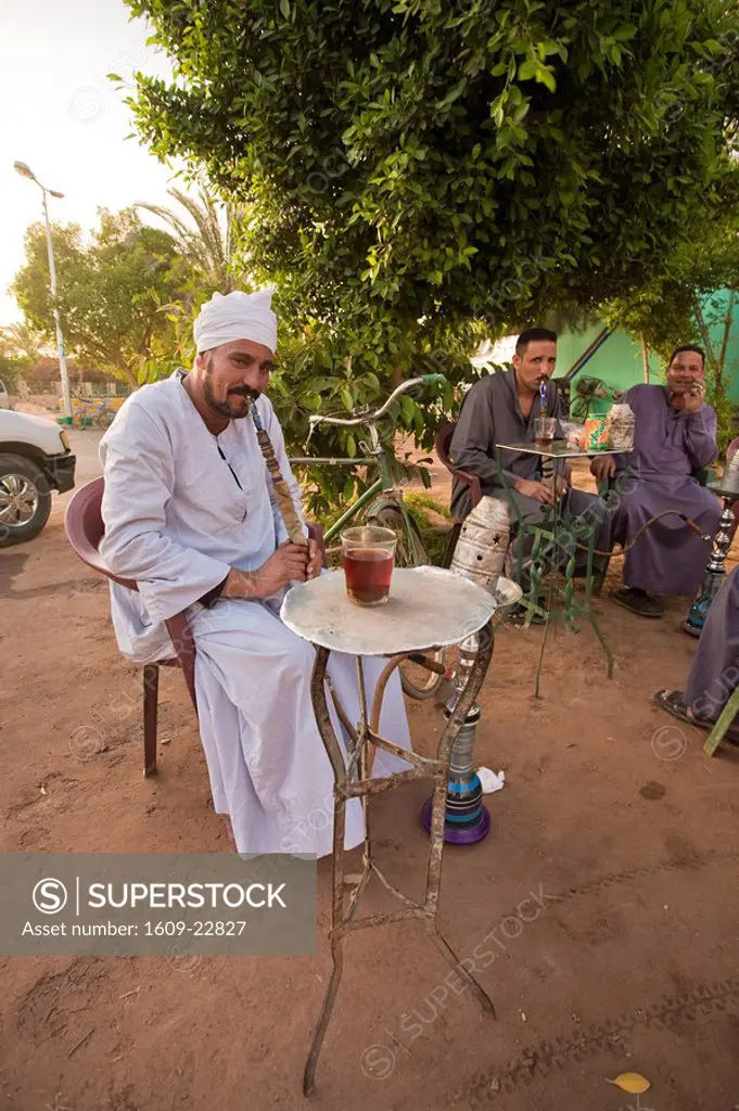 Men smoking waterpipe, Old City of Mut, Dakhla Oasis, Egypt