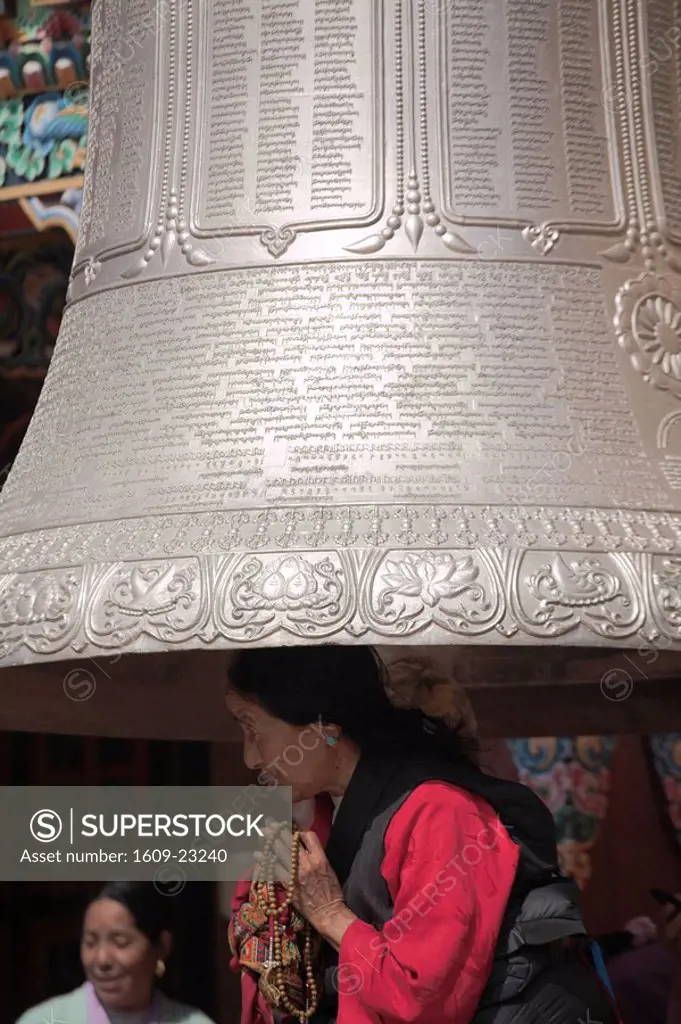 Nepal, Kathmandu, Bodhnath Buddhist stupa, monastery bell