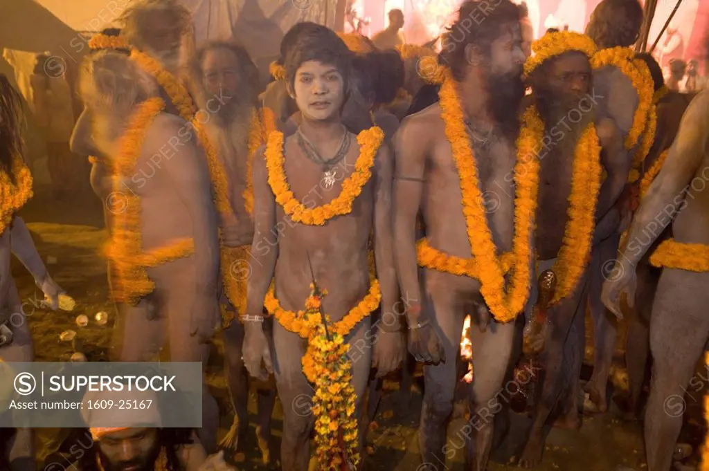 Naga Sadhus preparing for bathing in The holy river Ganges at Kumbh Mela Festival, Allahabad, Uttar Pradesh, India