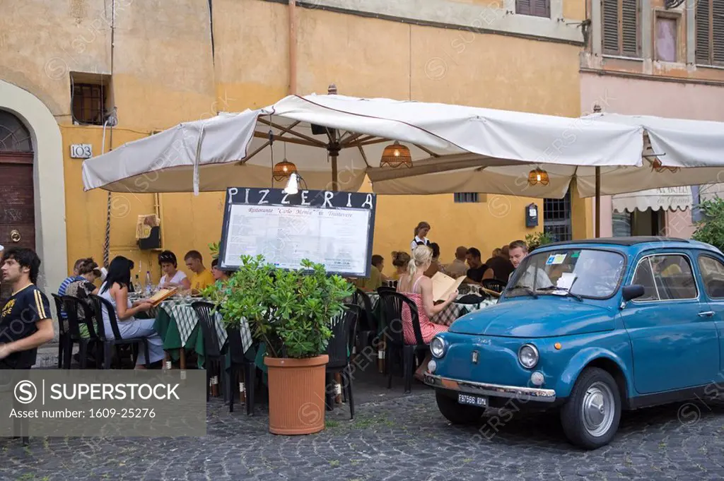 Pizzeria and old Cinquecento car, Trastevere, Rome, Italy