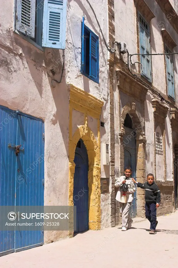Morocco, Essaouira, Medina alley with blue painted doors and window shutters