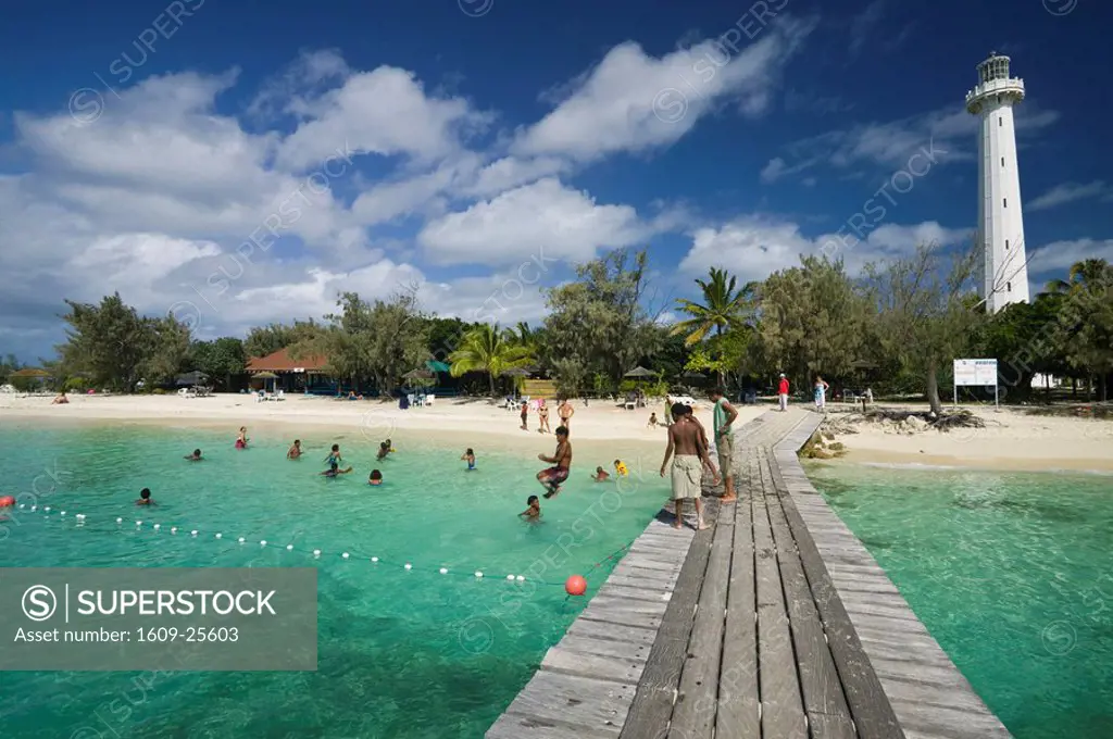 New Caledonia, Amedee Islet, Polynesian Kids playing on Amedee Islet Beach