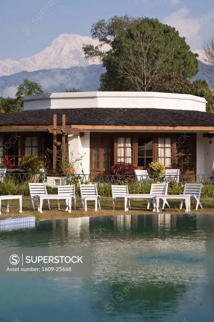 Nepal, Pokhara, Rooms and swimming pool at Fish Tail Lodge