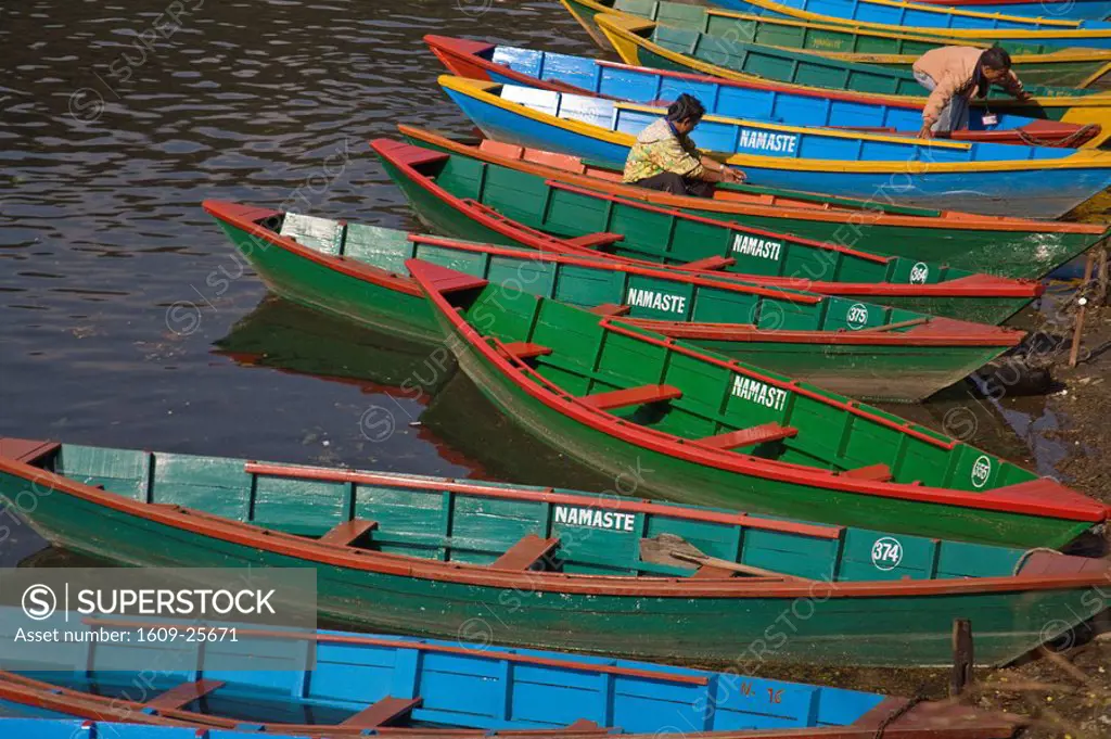 Nepal, Pokhara, Colourful canoes on Phewa Lake