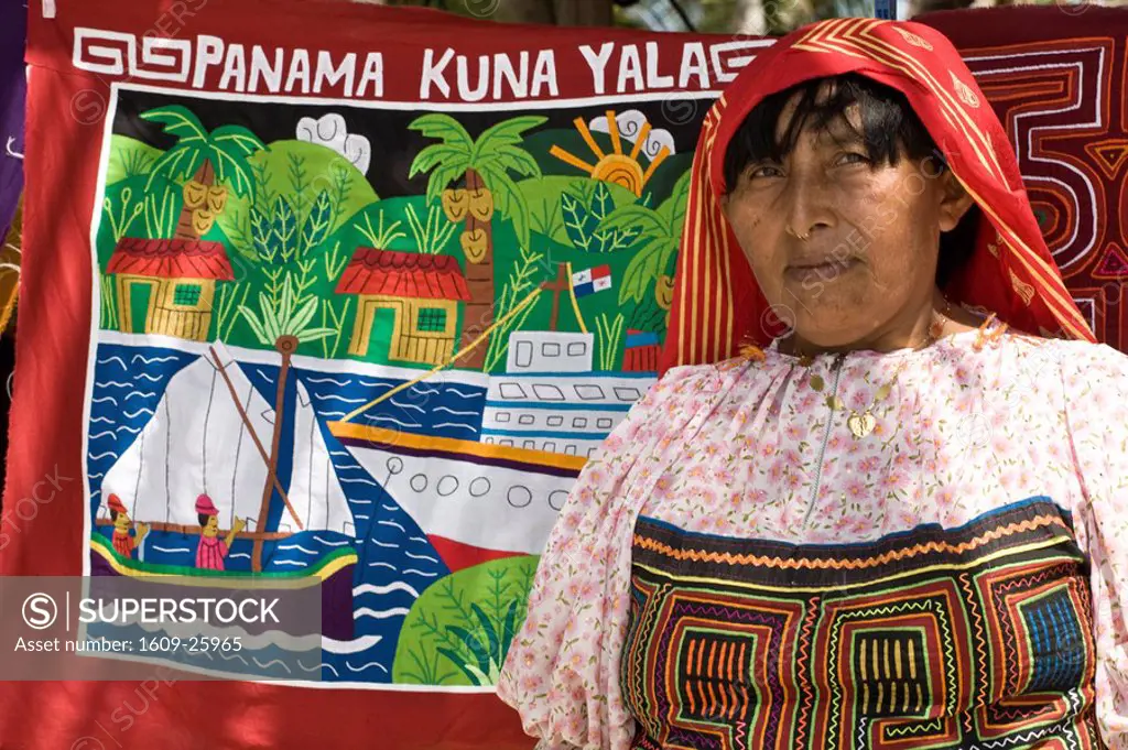 Panama, Comarca de Kuna Yala, San Blas Islands, Green Island, Kuna woman infront of Mola