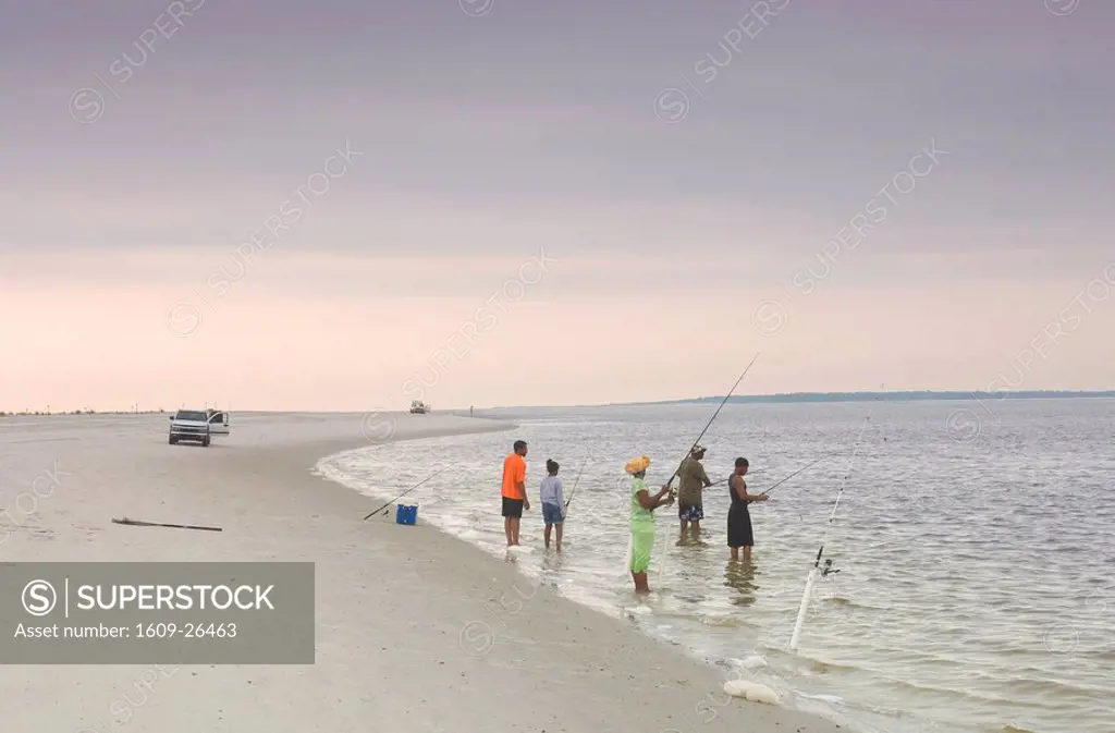 Family fishing at the beach on Amelia Island, Florida, USA