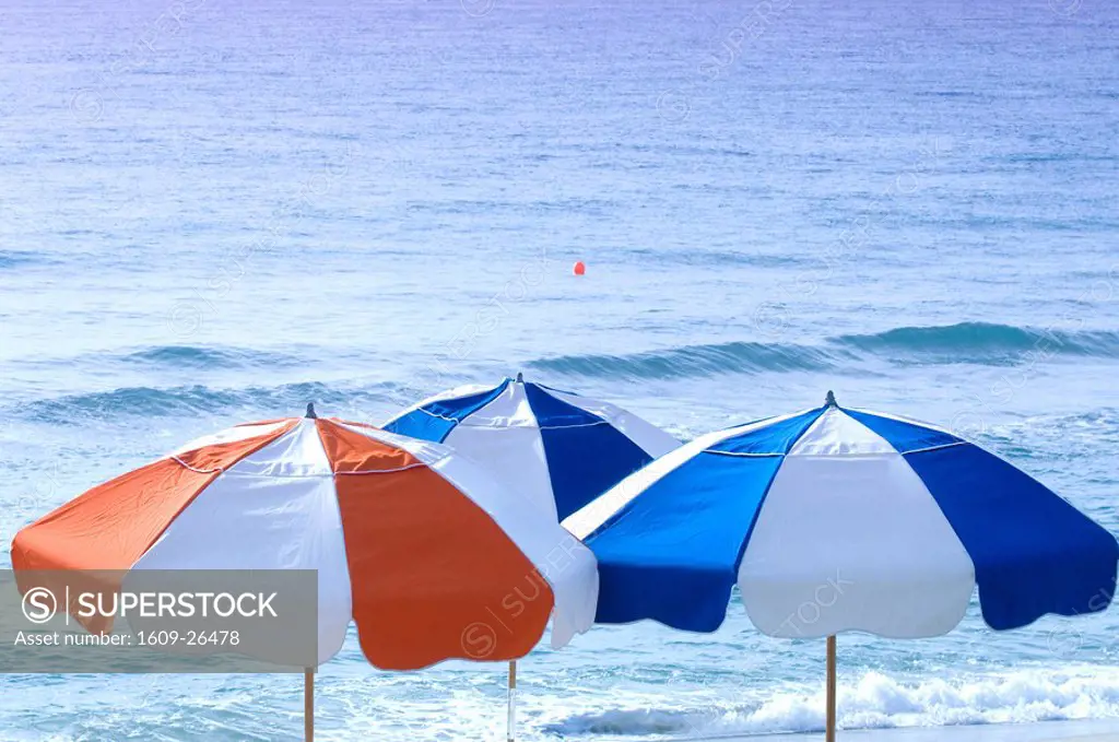 Colorful umbrellas on the beach at the Breakers Hotel, Palm Beach, Florida, USA
