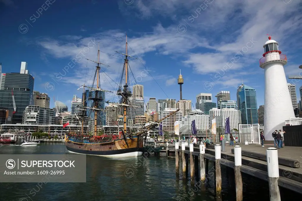 Australia, New South Wales, Sydney, City Skyline from Darling Harbour & replica of Captian Cook´s ship HMS Endevour