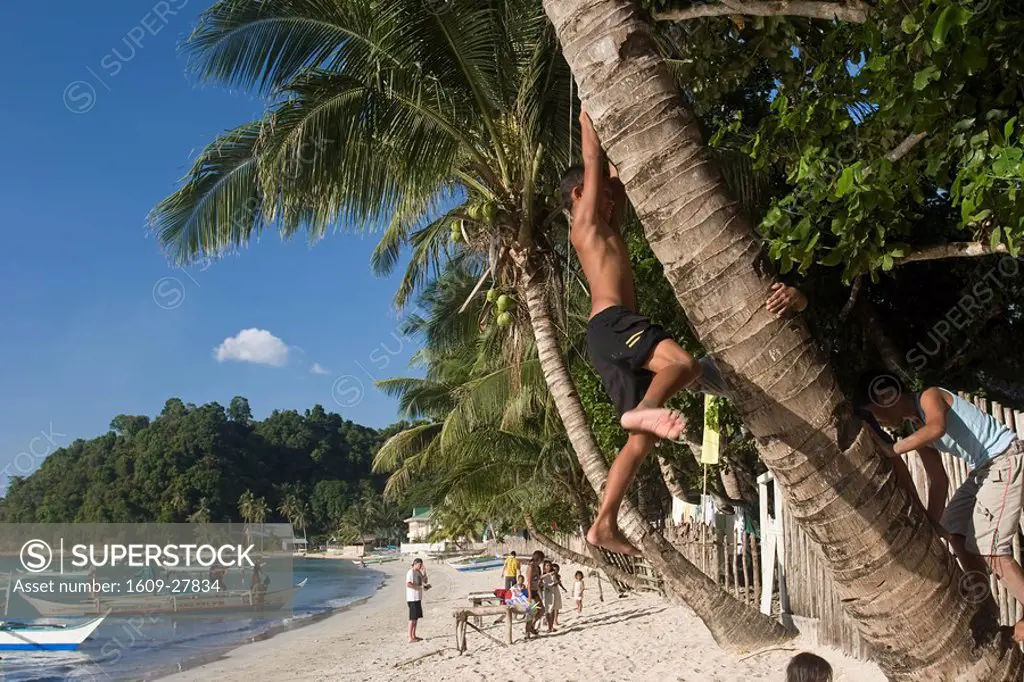 Children playing, El Nido Bay, Palawan Island, The Philippines