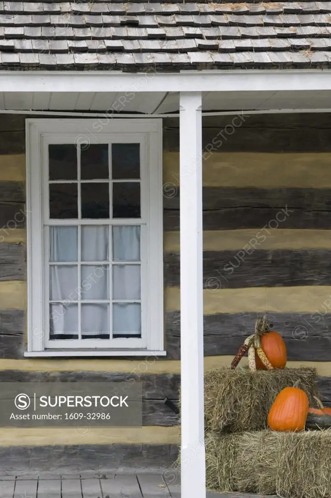 Log Cabin Porch with Pumpkins, Ligonier, Pennsylvania, USA