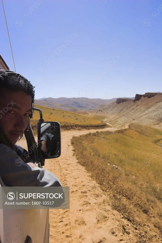 Afghanistan, between Yakawlang and Daulitia, Lal pass, Driver looks out of window