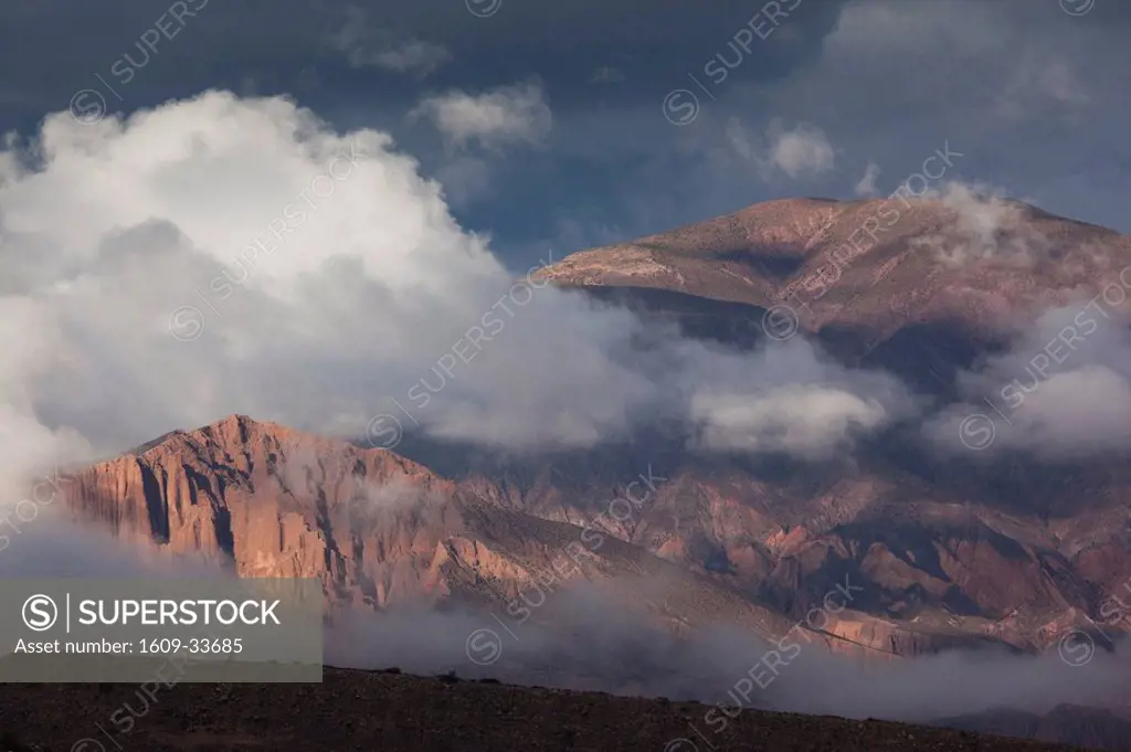 Argentina, Jujuy Province, Quebrada de Humamuaca canyon, Tilcara, morning mist over hill town