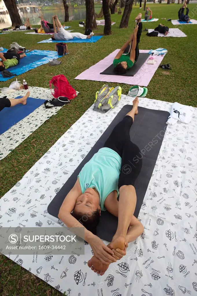 Thailand, Bangkok, People Practicing Yoga in Lumphini Park