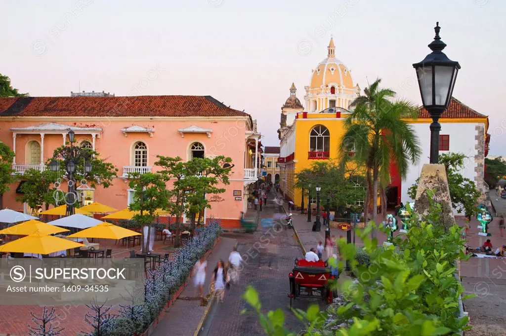 Colombia, Bolivar, Cartagena De Indias, Plaza Santa Teresa, Horse carts going past Hotel Charleston Cartagena towards the Naval Museum, and San Pedro ...