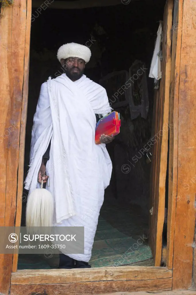 Ethiopia, Lalibela, Ashetan Maryam, Priest in doorway