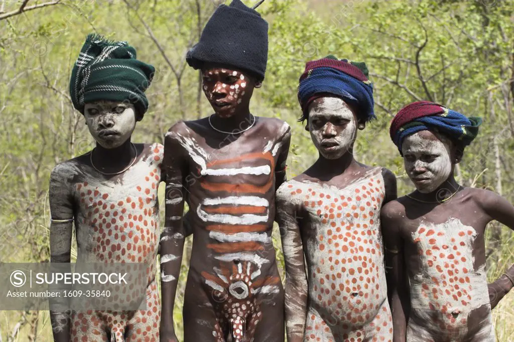Ethiopia, South Omo Valley, Mursi boys with body painting