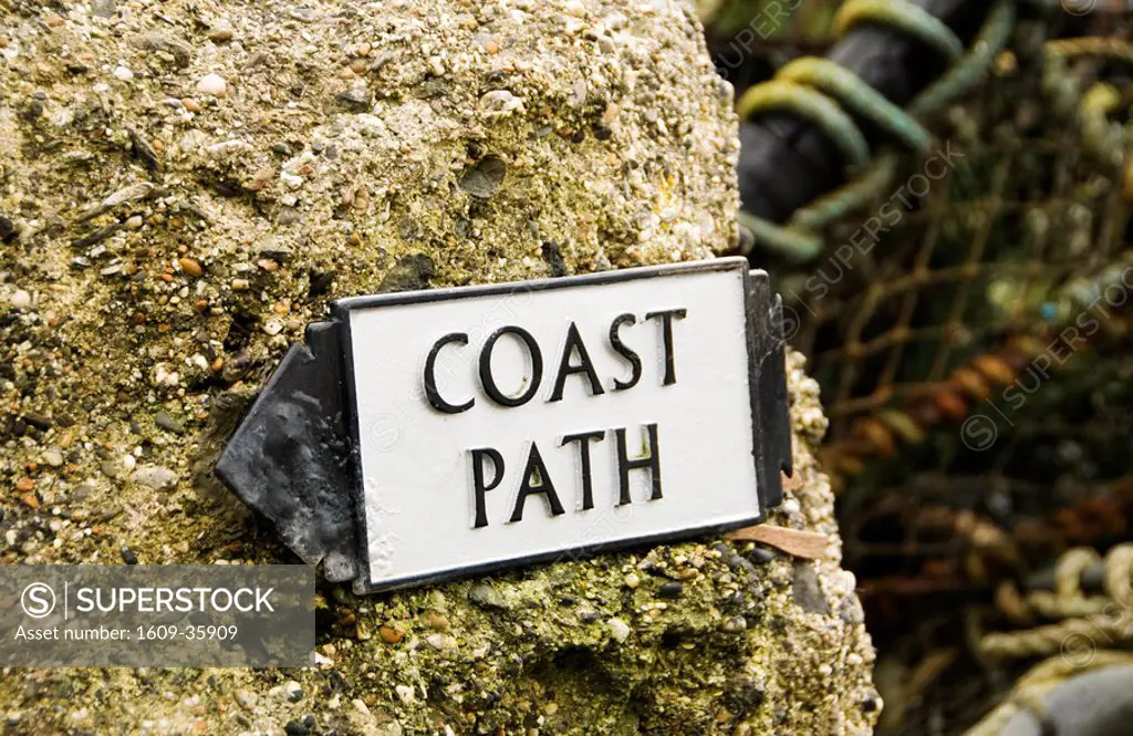 South West Coastal Path sign in Cadgwith Cove near The Lizard, Cornwall, UK