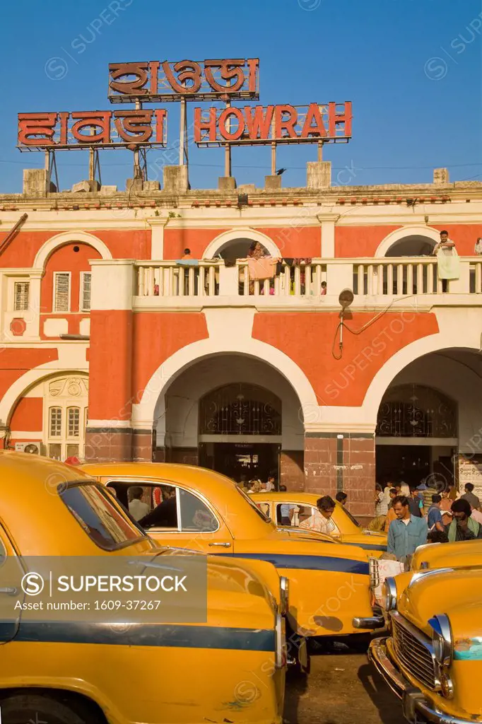 India, West Bengal, Kolkata, Calcutta, Yellow ambassador taxis outside Howrah train station