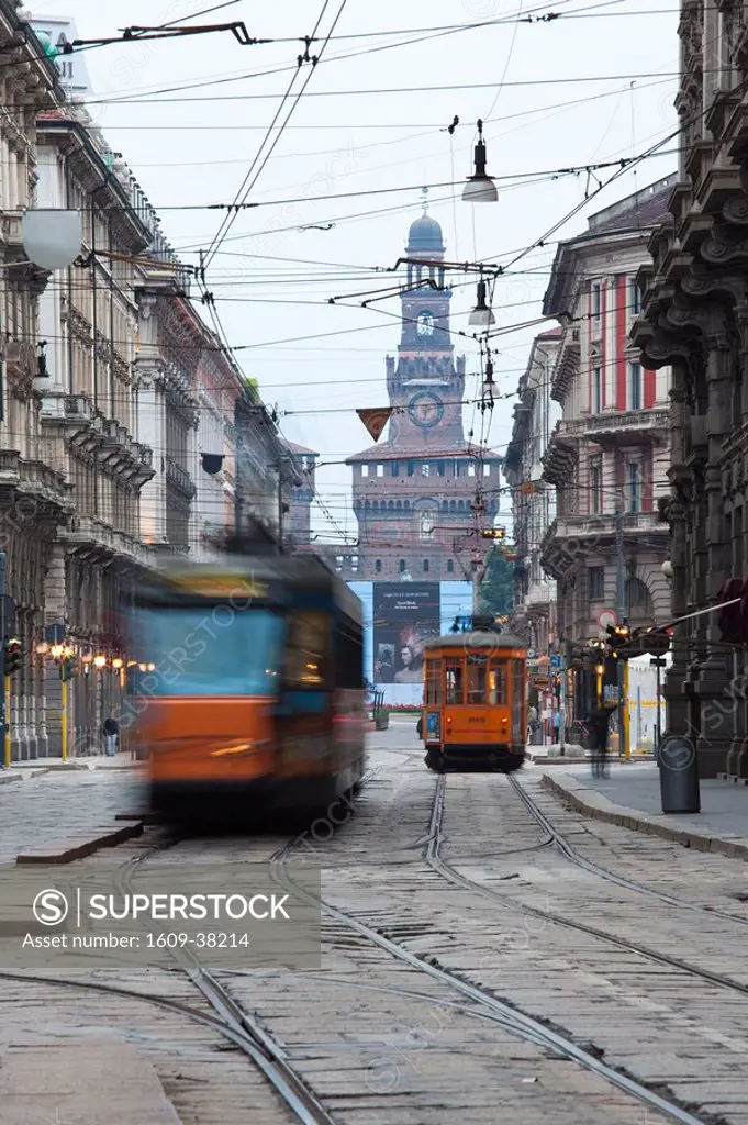 Italy, Lombardy, Milan, Milan trams on Via Orefici with Castello Sforzesco, dawn