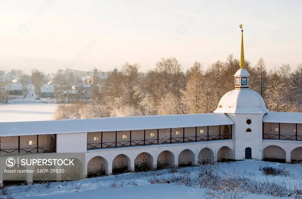 Walls of Bogorodichno_Uspenskij Monastery with town Tikhvin in the background, Leningrad region, Russia
