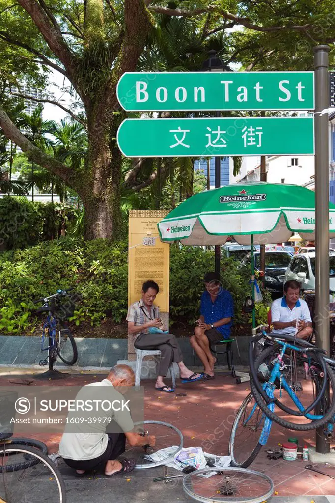 Bicycle repair on Boon Tat Street in Chinatown, Singapore, South East Asia