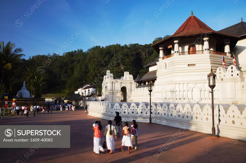 People outside Temple of the Tooth Sri Dalada Maligawa, Kandy, Sri Lanka