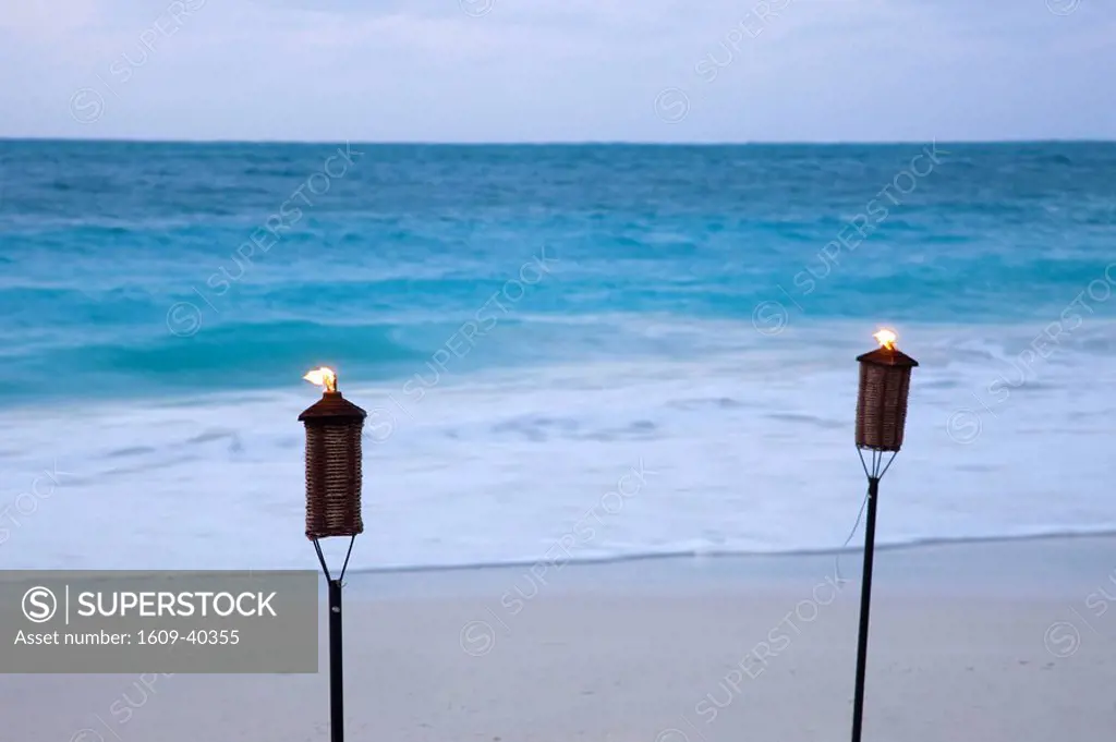 Torches on beach, Grace Bay, Providenciales, Turks and Caicos
