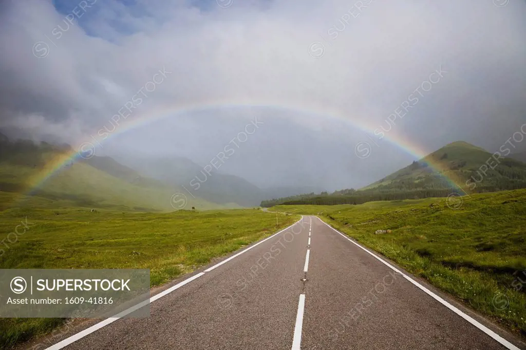 Scotland, Highland Region, Empty Road and Rainbow