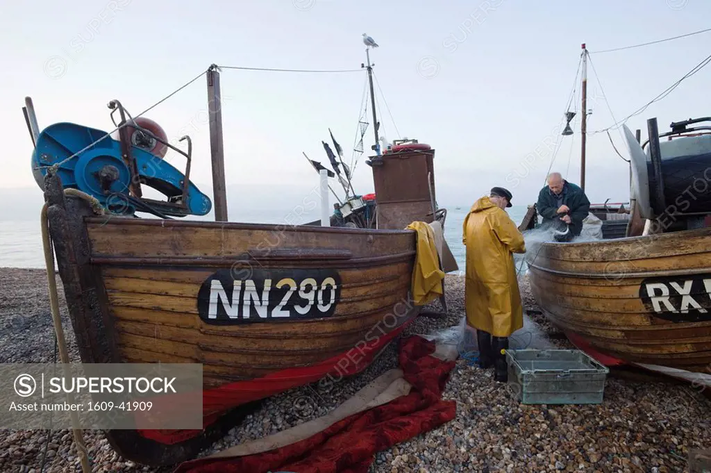 England, East Sussex, Hastings, The Stade, Fishermen Sorting their Catch