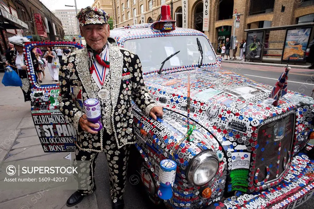 England, London, Pearly King and Decorated London Taxi