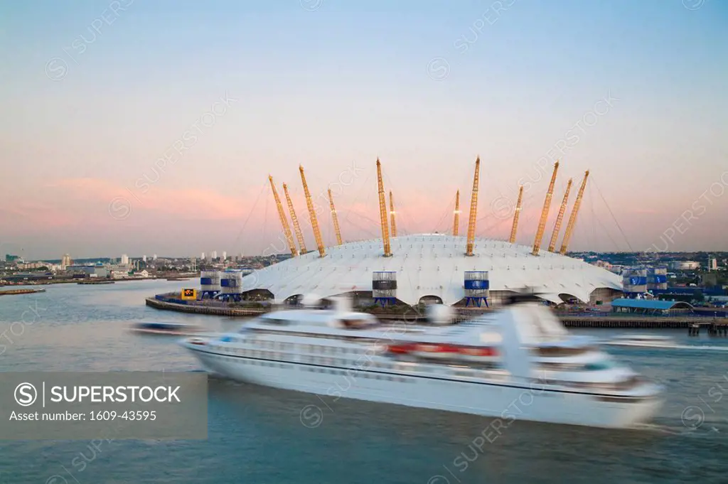 England, London, Ariel view of Cruise ship passing O2 Arena, Millennium Dome