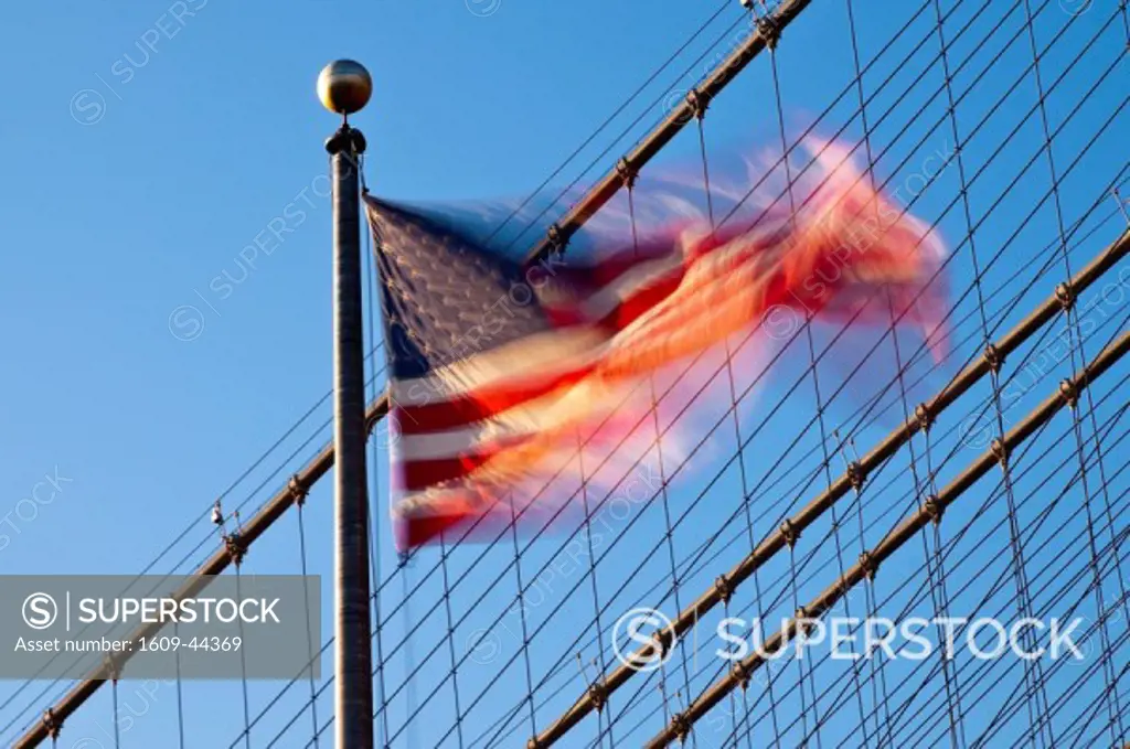 USA, New York, Manhattan, Brooklyn Brisge and Stars and Stripes flag