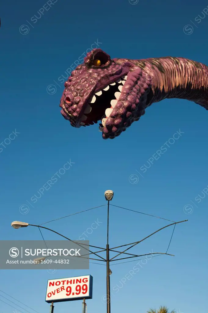 USA, Florida, Florida Panhandle, Panama City Beach, dinosaur statue at miniature golf course