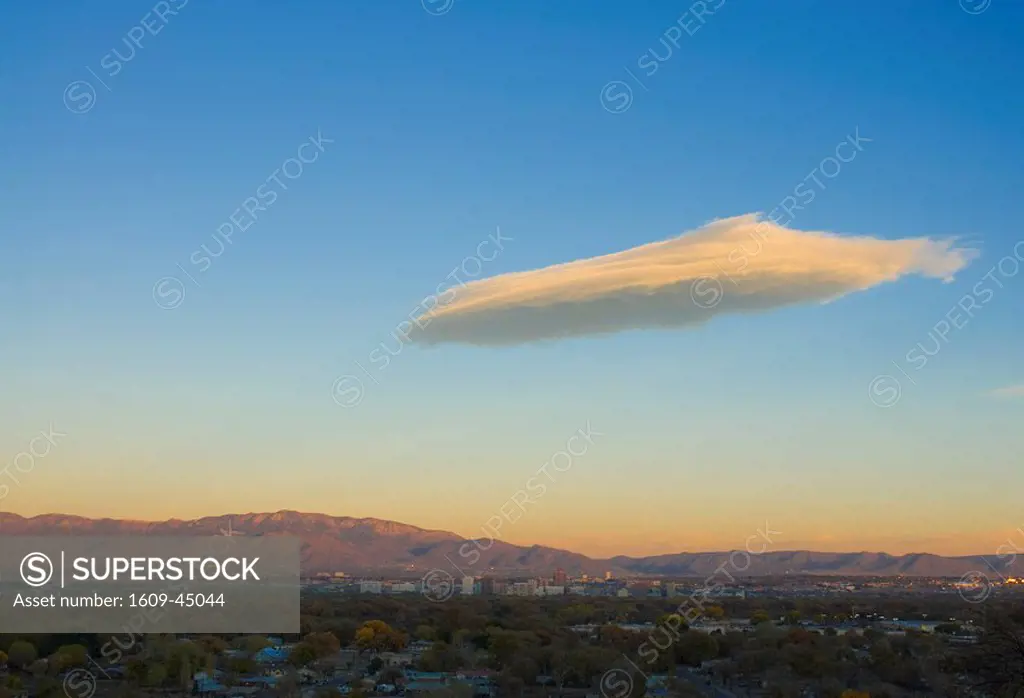 USA, New Mexico, Albuquerque, Skyline, Sandia Mountains and Lenticular Cloud
