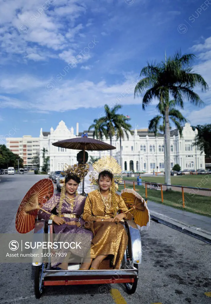 Girls in tradional costumes, Penang, Malaysia