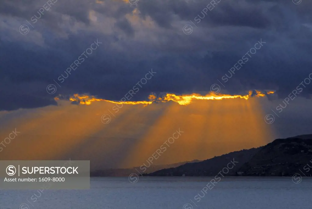 Sun rays through clouds