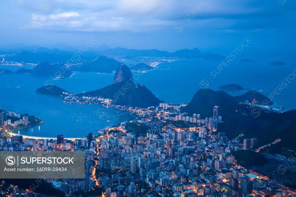 Brazil, Rio De Janeiro, Cosme Velho, View of Sugar Loaf mountain and Botafogo Bay from Cocovado at night