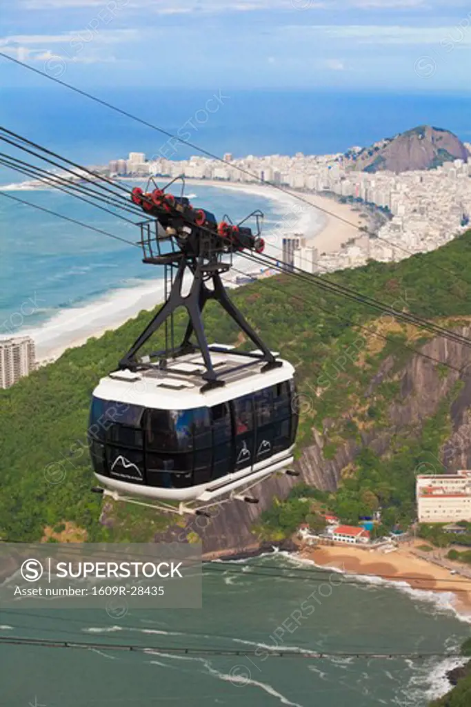 Brazil, Rio De Janeiro, Urca, Cable Car on Sugar Loaf Mountain with view of  Vermelha beach and Copacabana