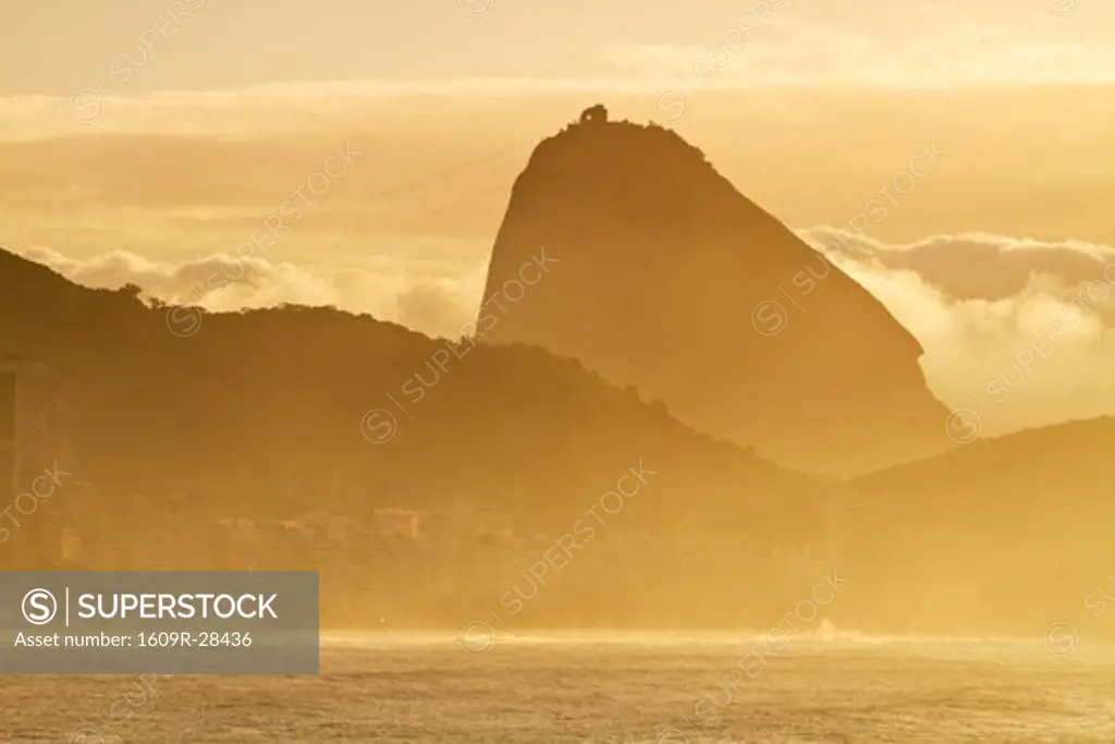 Brazil, Rio De Janeiro, View of Sugar Loaf at sunrise from Copacabana