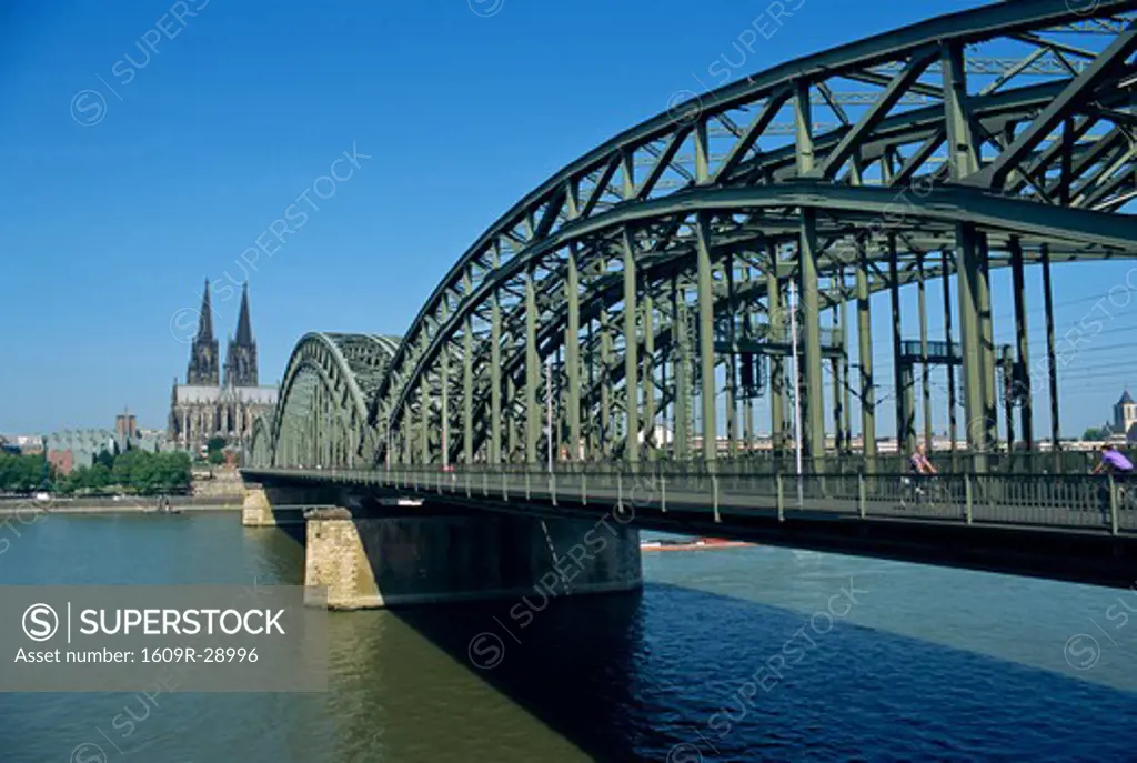 Hohenzoller Bridge over River Rhine and Cathedral, Cologne (Koln), North Rhine-Westphalia, Germany